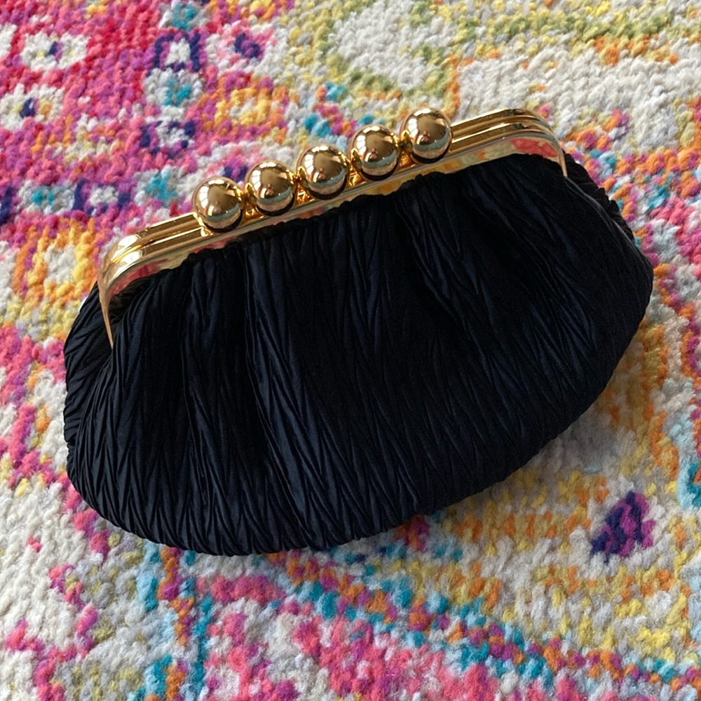 Carla Marchi convertible clutch.